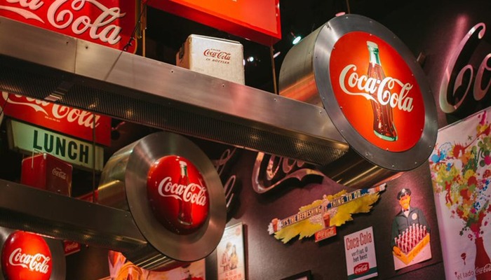 Various incarnations of the Coca-Cola logo and brand