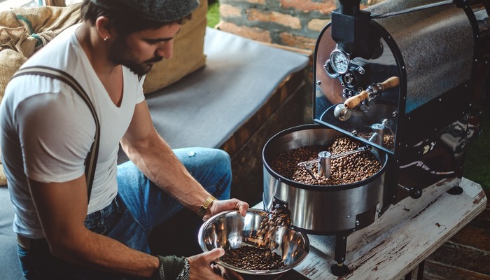 Entrepreneur roasting his own coffee beans