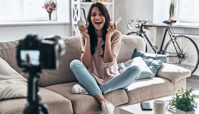 Social media influencer talking to her camera