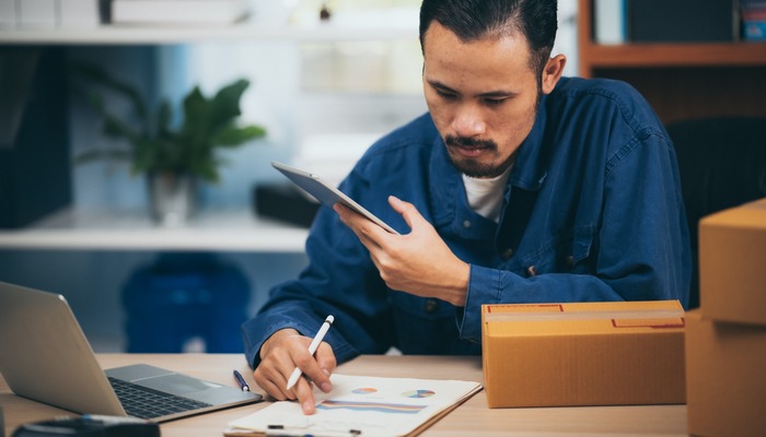 Entrepreneur with boxes