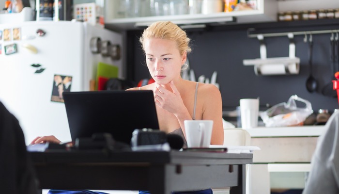A female freelancer working at home on her laptop