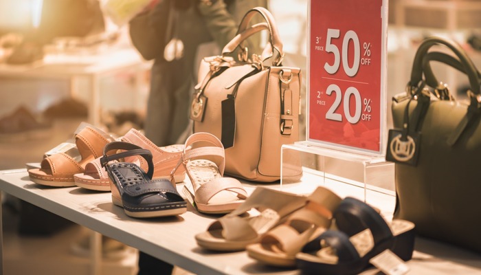 Shoes and handbags on display in a shop