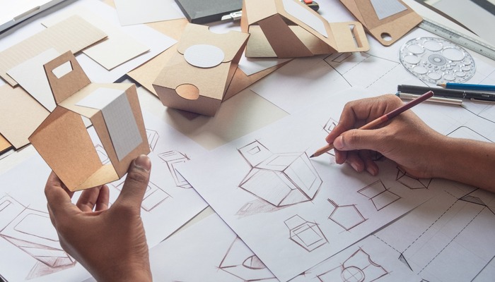 Person designing packaging for a product
