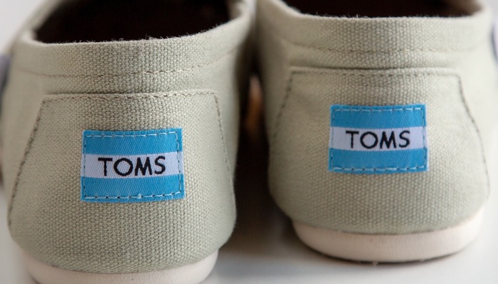 A closeup of a pair of TOMS shoes