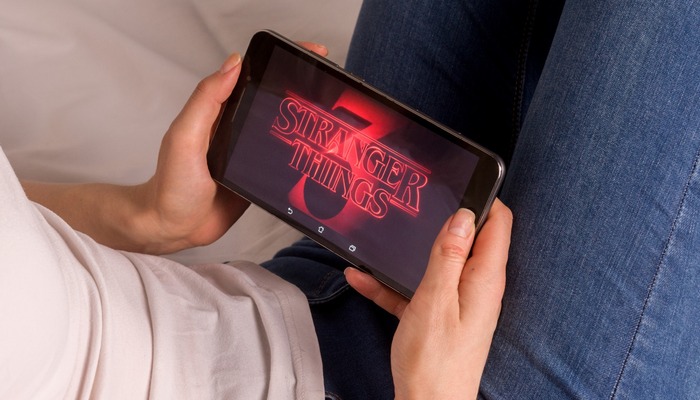Person watching Stranger Things on a mobile phone