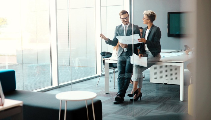 Business colleagues collaborating and discussing project plans